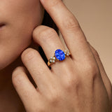 Criss Cross Diamond Ring with Oval Cut Tanzanite