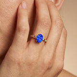 Oval Solitaire Tanzanite Ring with Twisted Wire Diamond Band